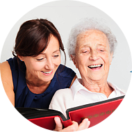 adult woman and senior woman smiling